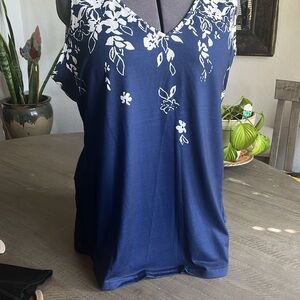 Navy blue jersey poly sleeveless top.